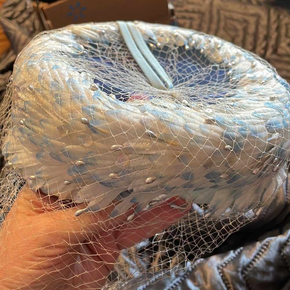 Clover Lane Vintage pillbox hat with netting.